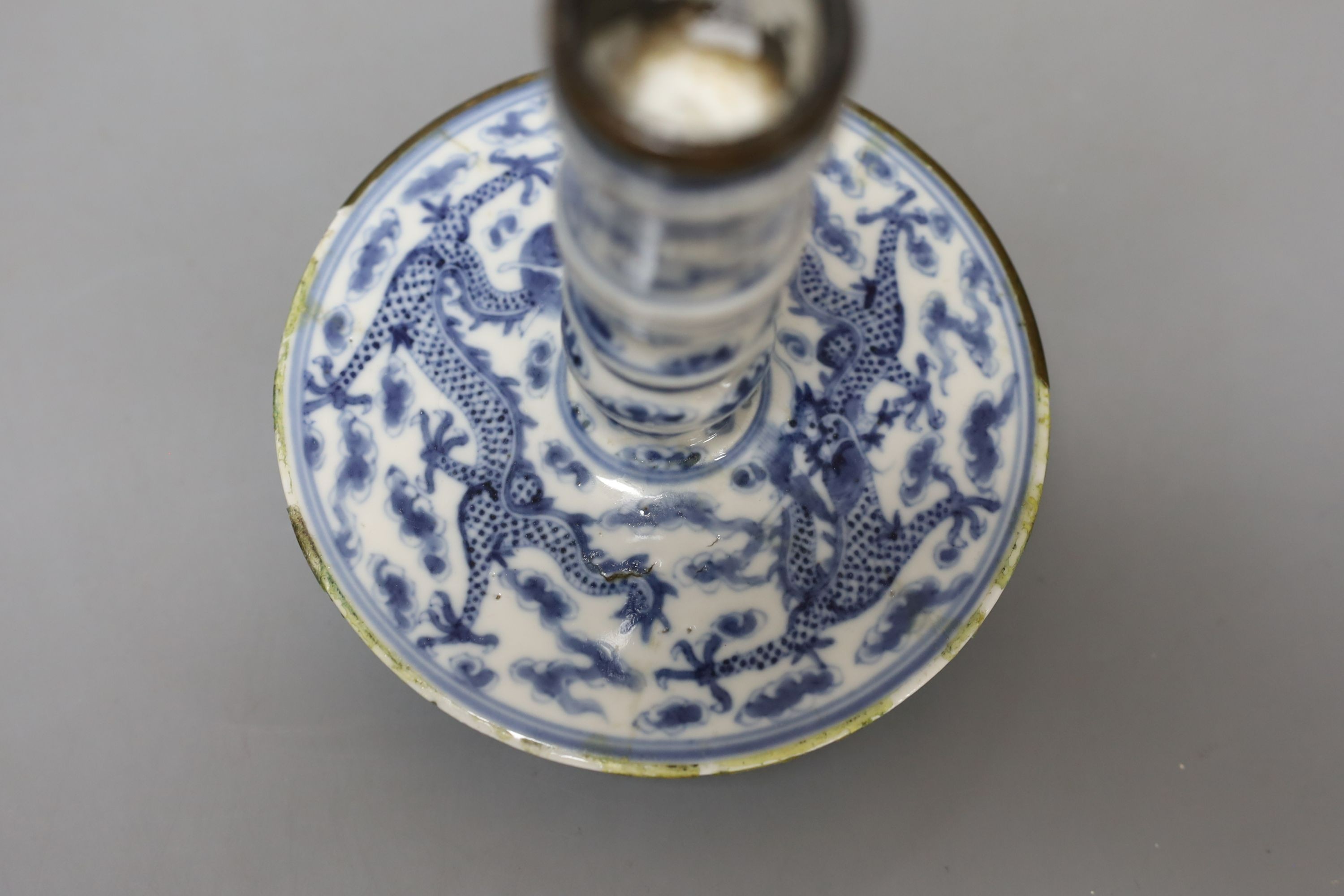 Three Chinese ceramics, including a yellow bowl with inscription to base, 7cm tall, blue and white dragon pattern candlestick mount and export dish